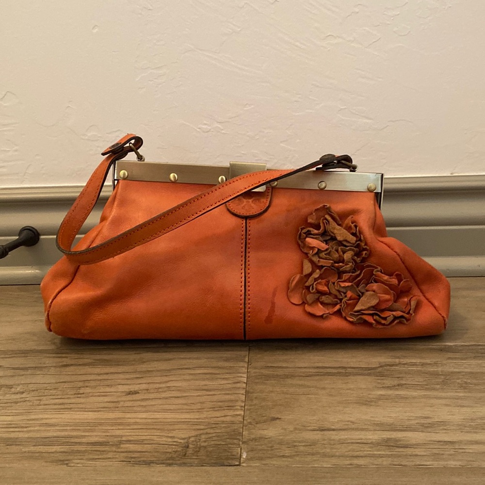 Patricia Nash Italian leather handbag - coral exterior with golf hardware